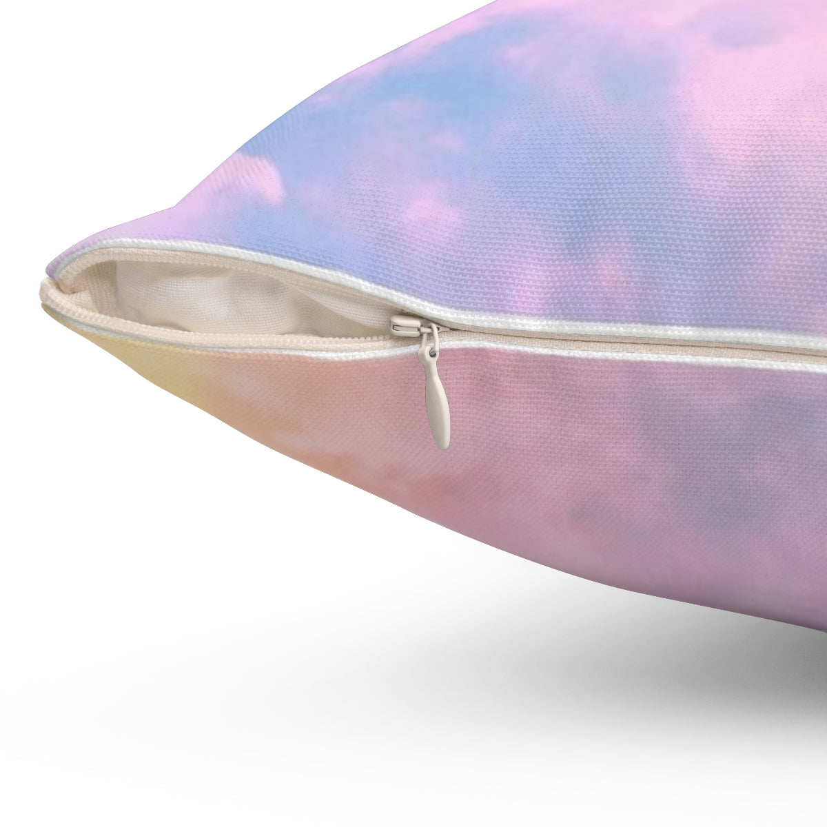 A soft, pink and pastel-colored throw pillow with a sunset and cloud design, inspired by Taylor Swift's aesthetic. - Detail