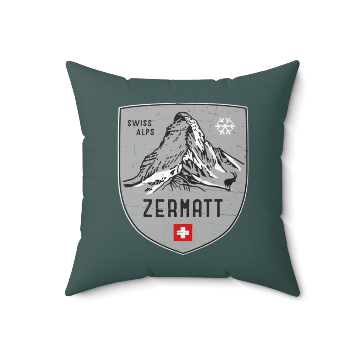 Decorative throw pillow featuring an emblem design inspired by the scenic Swiss Alps mountains