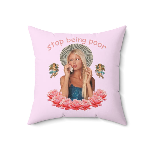 Satirical "Stop Being Poor" pillow with pop art inspired design featuring Paris Hilton