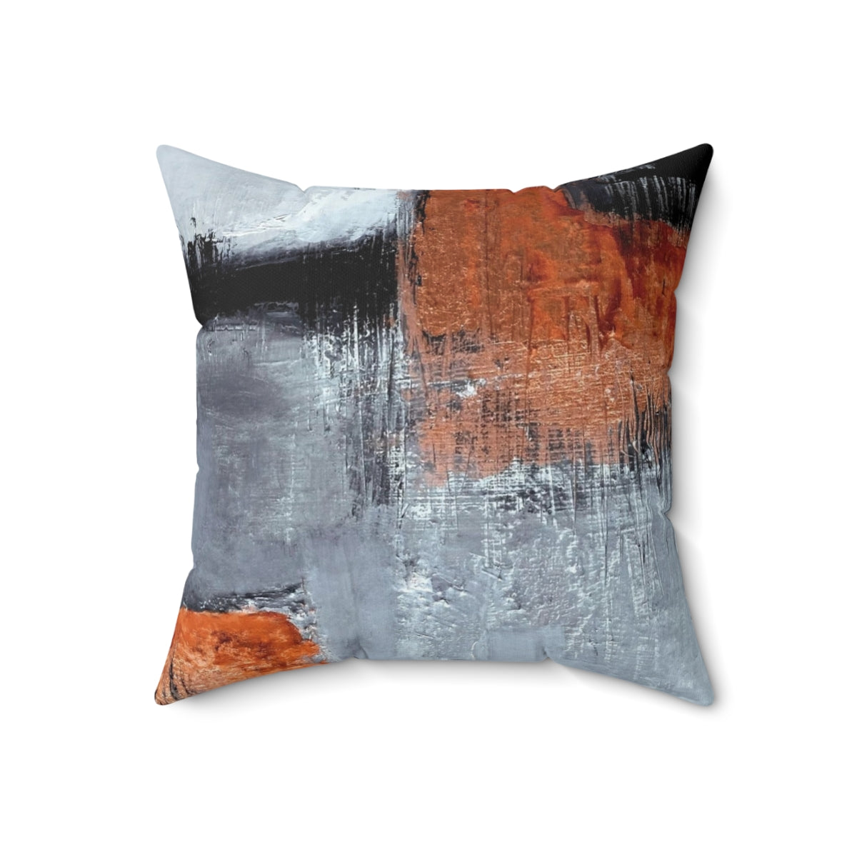 A modern abstract throw pillow in black and orange with a textured, geometric design