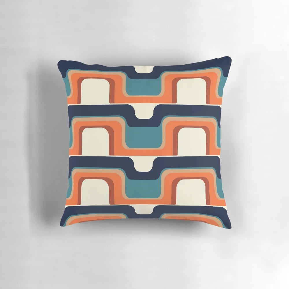 1970s inspired orange and blue throw pillow with a retro futurism wave pattern design