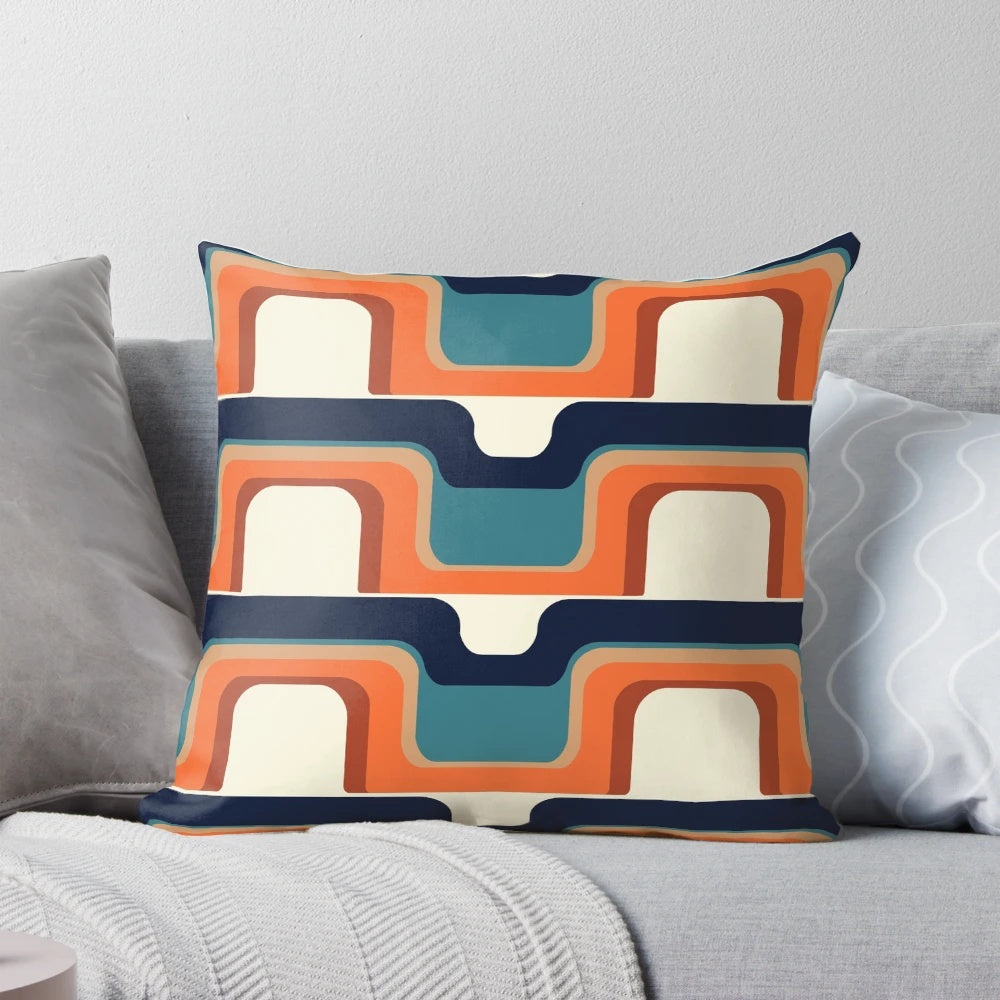 1970s inspired orange and blue throw pillow with a retro futurism wave pattern design
