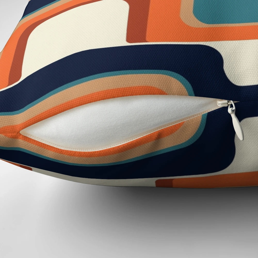 1970s inspired orange and blue throw pillow with a retro futurism wave pattern design