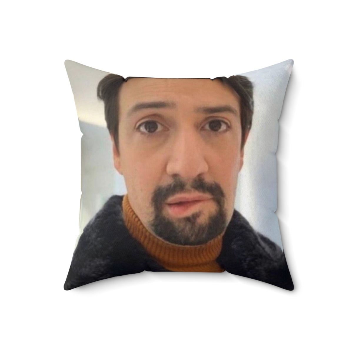 Pillow featuring the popular "Manuel Miranda lip bite" meme from the Hamilton musical and TikTok.