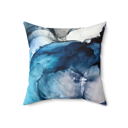 Vibrant abstract alcohol ink painting depicting a serene ocean landscape with waves, sand, and calming blue tones.