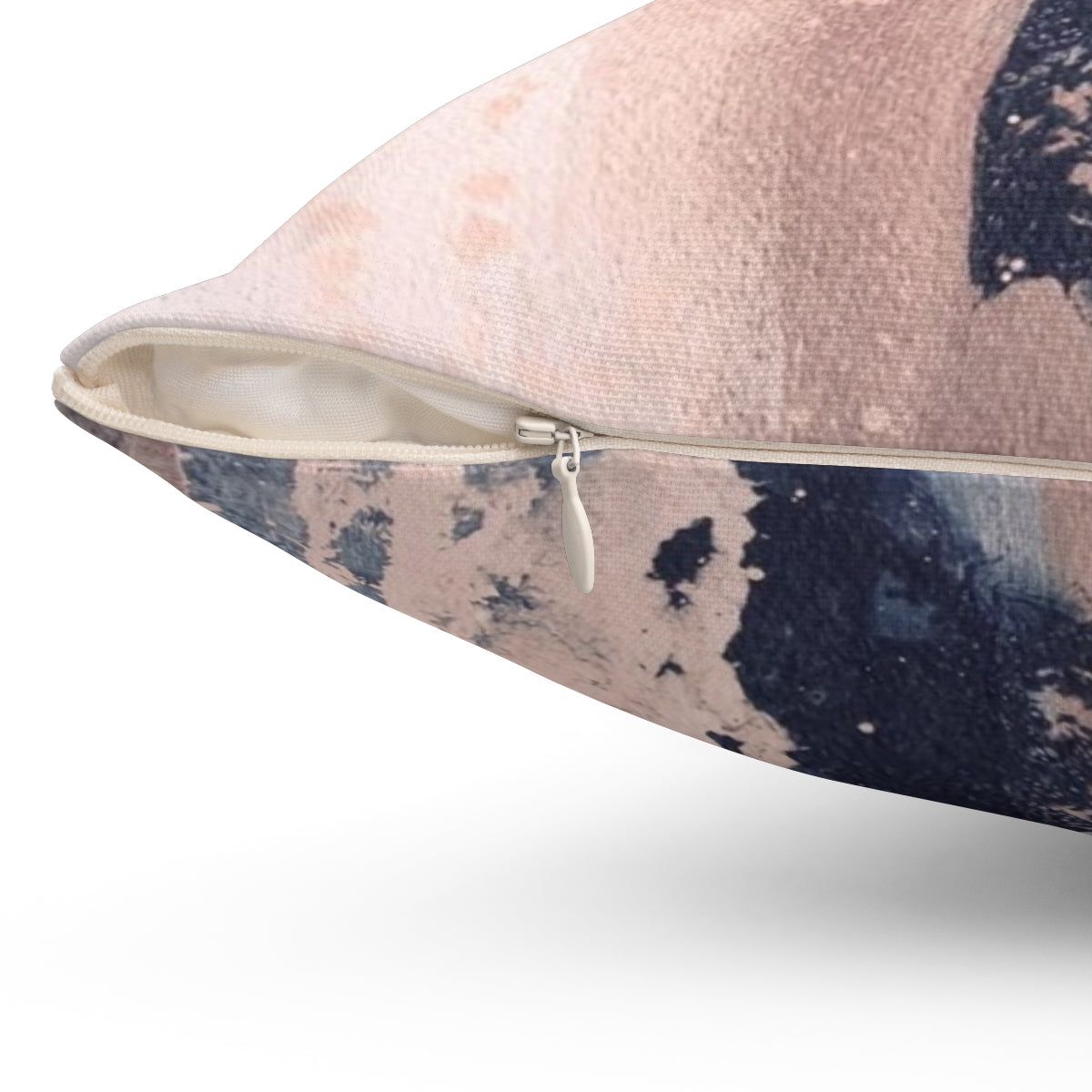 Horizontal abstract art pillow in shades of blush pink and navy blue, featuring brushstrokes and a modern, industrial-style design. - Detail