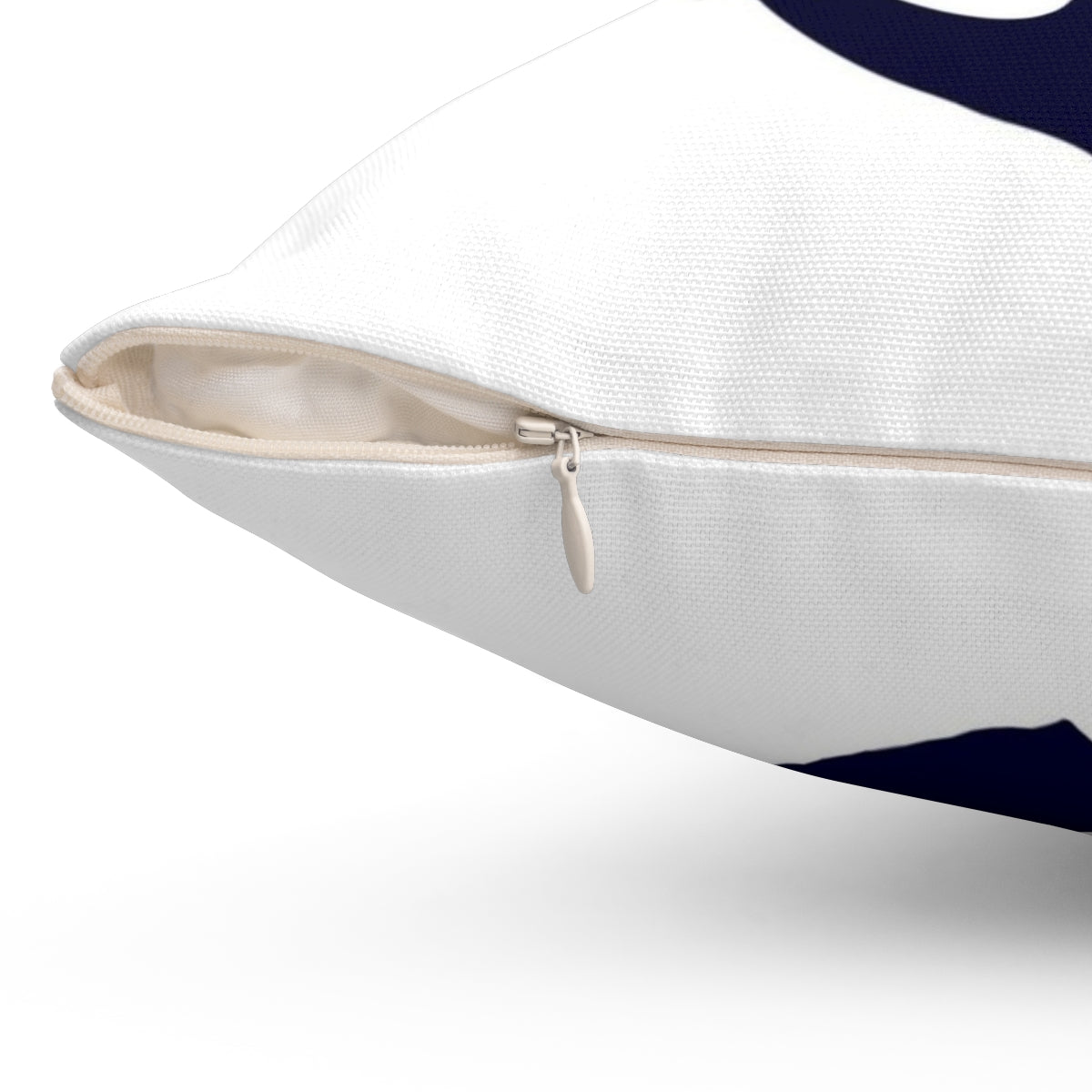 Navy blue anchor-themed pillow against a white background - Detail