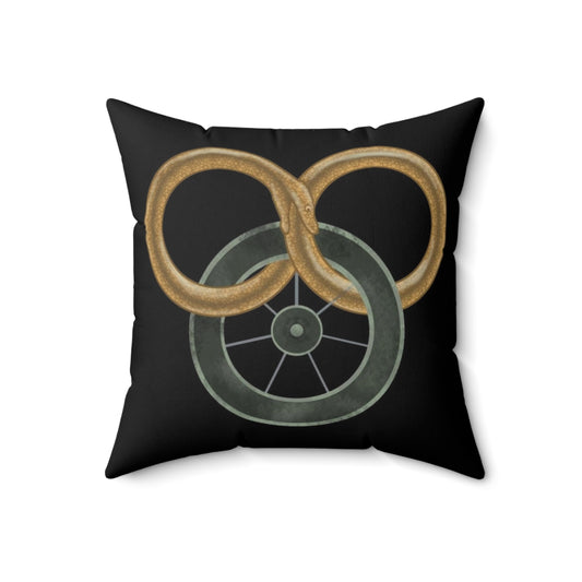 Stylized illustration of the Wheel of Time symbol on a decorative throw pillow