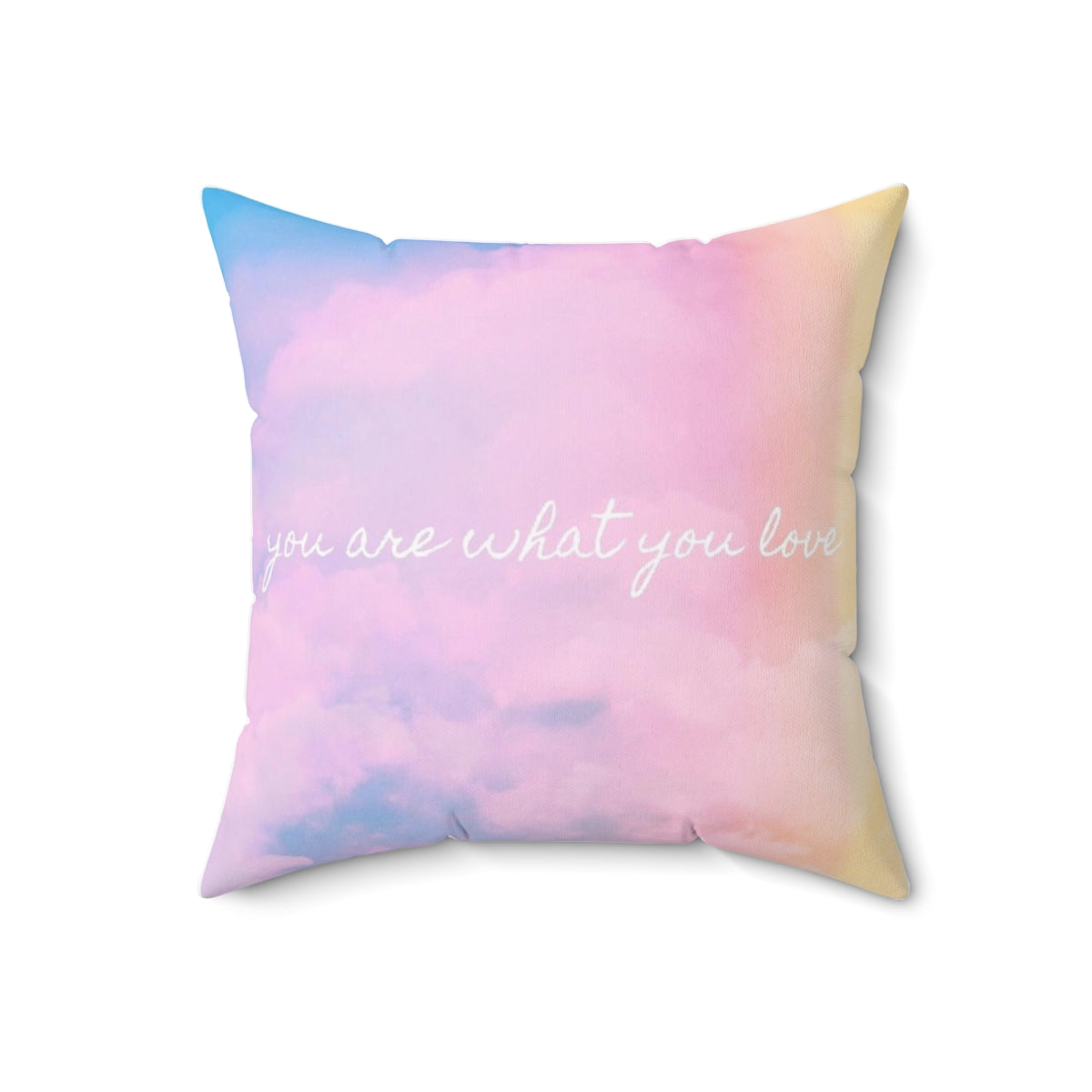 A soft, pink and pastel-colored throw pillow with a sunset and cloud design, inspired by Taylor Swift's aesthetic.