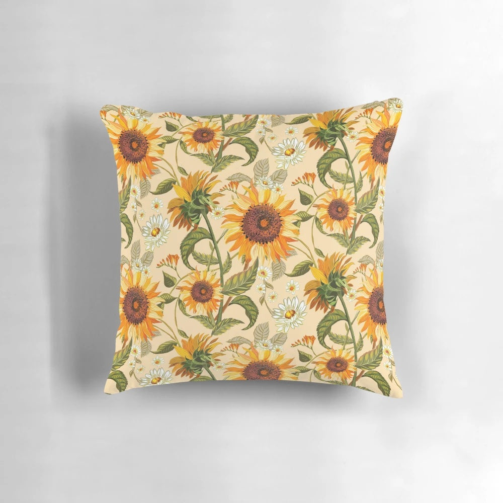 Vibrant sunflower pattern in shades of yellow and orange on a throw pillow, evoking a retro 70s aesthetic.