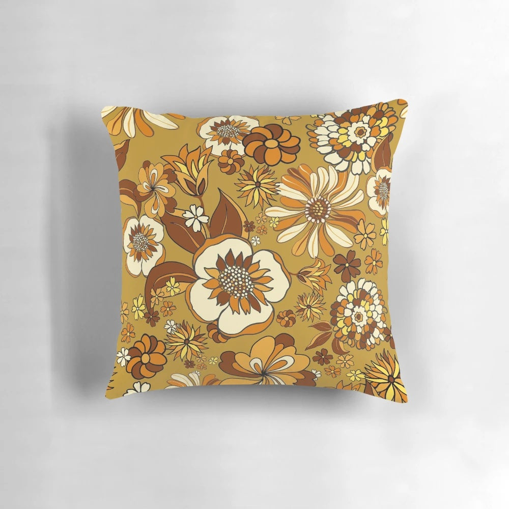 70s vintage flower power floral pattern pillow in orange, mustard, and yellow shades