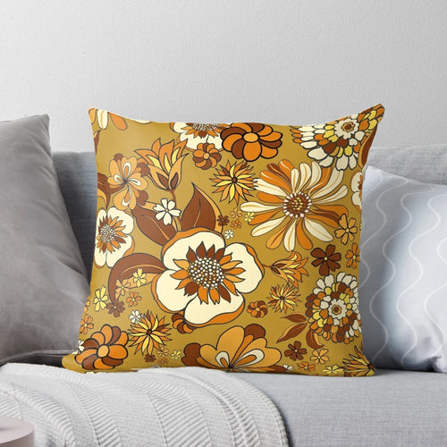 70s vintage flower power floral pattern pillow in orange, mustard, and yellow shades