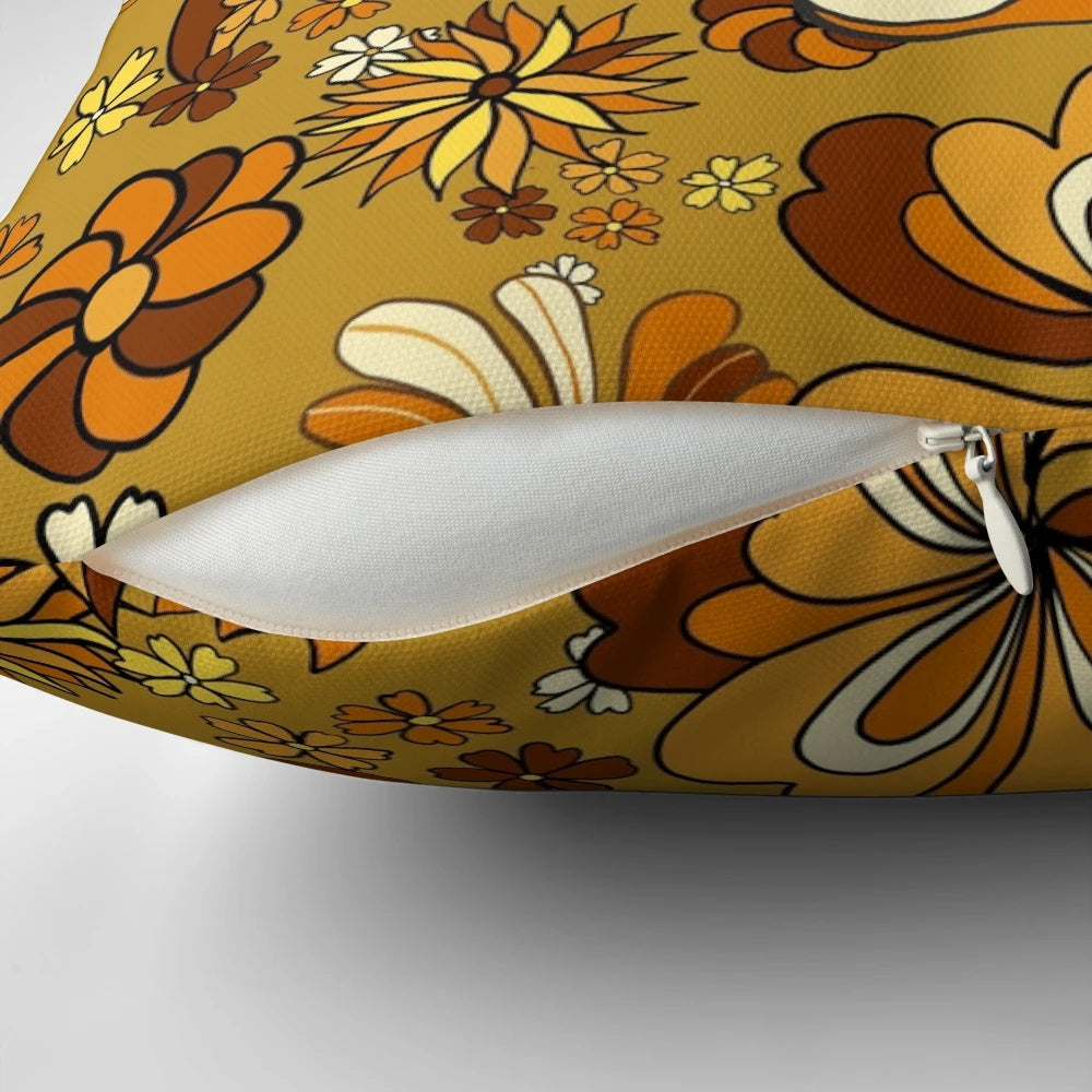 70s vintage flower power floral pattern pillow in orange, mustard, and yellow shades
