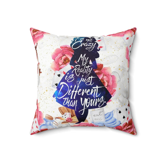 Decorative throw pillow featuring a quote from the classic Alice in Wonderland book