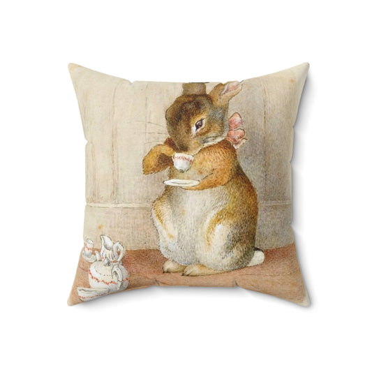 Vintage-style decorative pillow featuring a whimsical rabbit tea party scene inspired by the art of Beatrix Potter