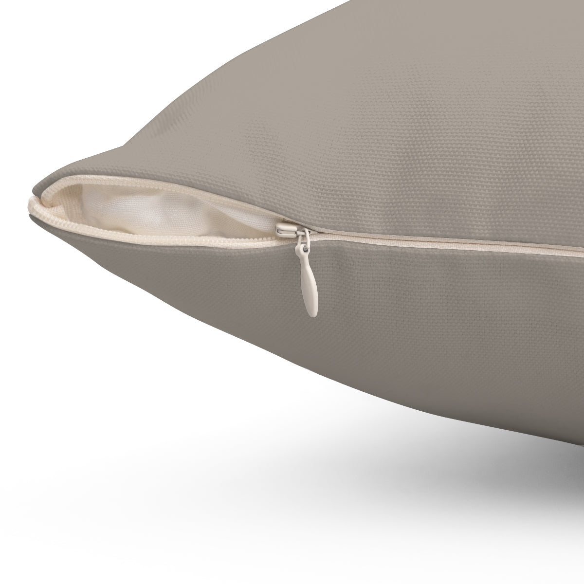 Taupe solid color pillow with a simple, minimalist abstract design inspired by nature - Detail