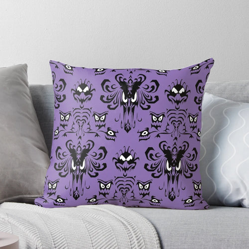 999 Happy Haunts Pillow featuring a haunted mansion with creepy eyes and grim grinning ghosts