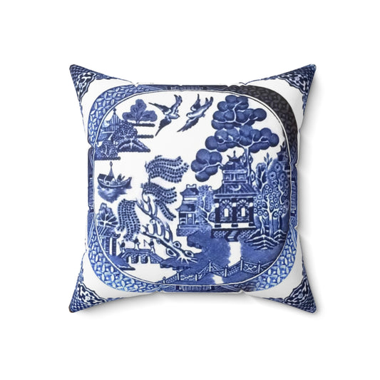 Vintage-inspired blue and white porcelain decorative pillow featuring a classic willow pattern design