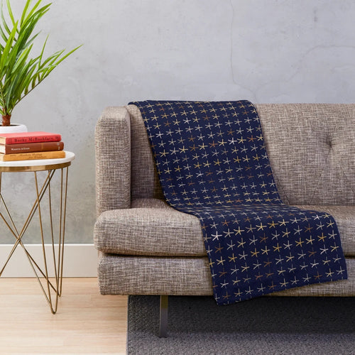 Plush blanket featuring ancient Egyptian motifs and patterns
