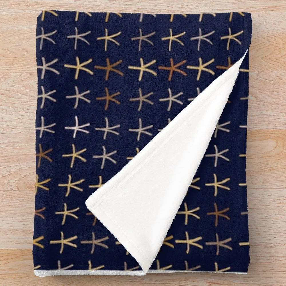 Plush blanket featuring ancient Egyptian motifs and patterns