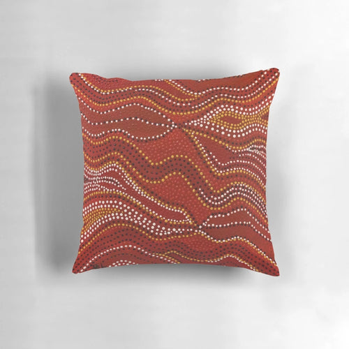Aboriginal-inspired stone country pillow with dotted design by Australian indigenous artist David Peake
