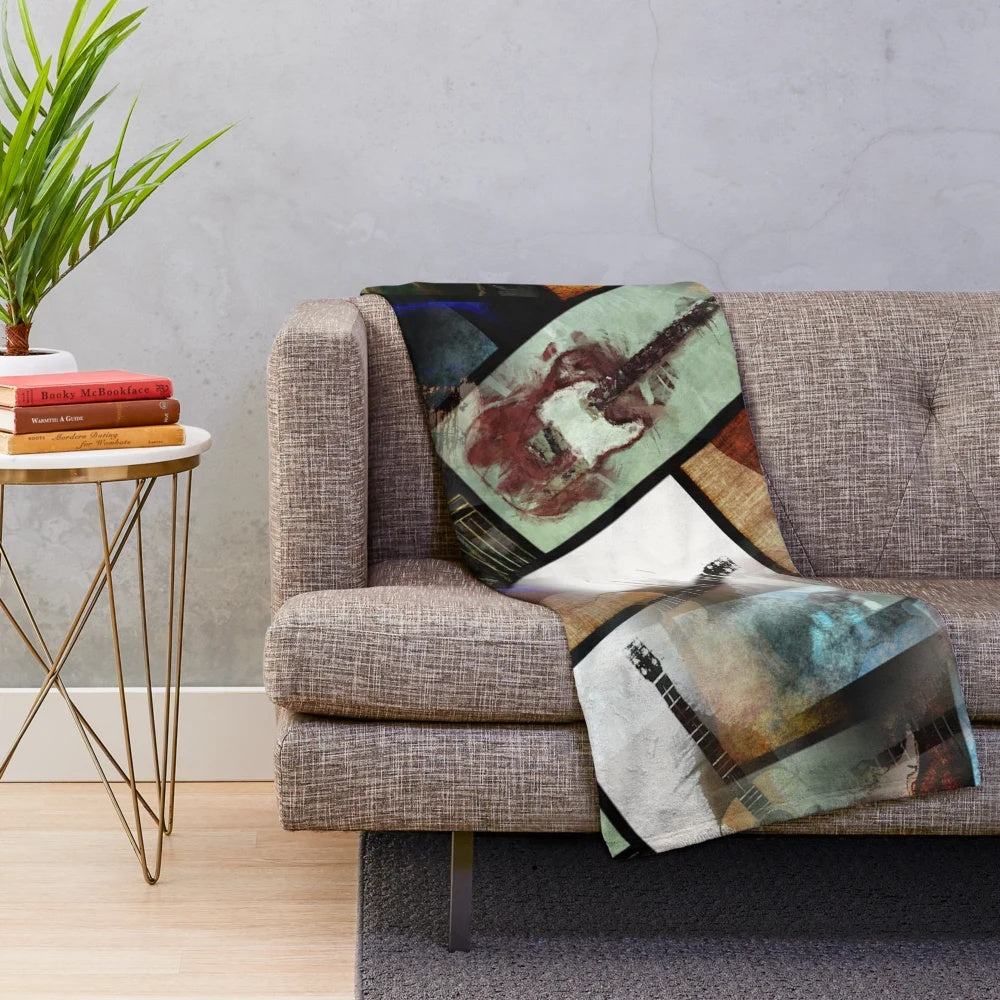 An abstract plush blanket featuring a collage of six guitars