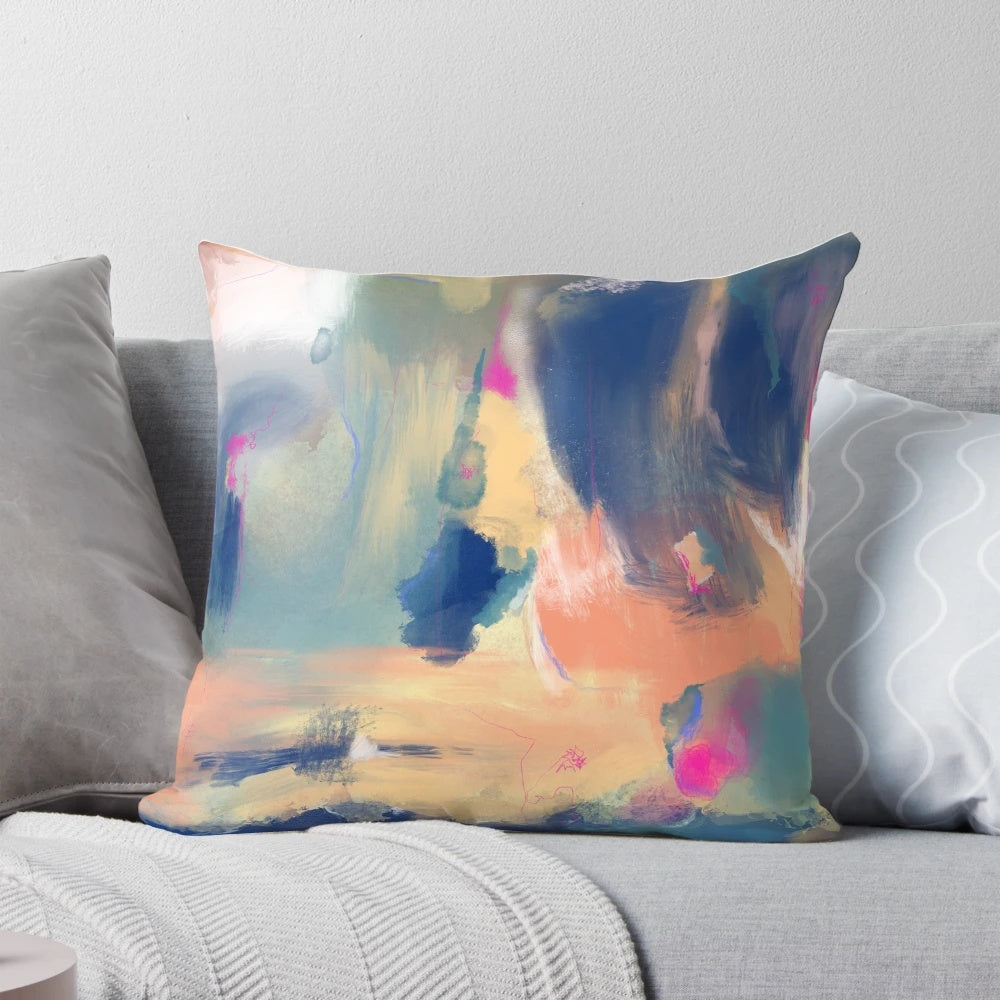 Vibrant abstract art digital print decorative throw pillow in shades of blue, orange, and pink.