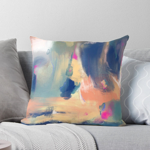 Vibrant abstract art digital print decorative throw pillow in shades of blue, orange, and pink.