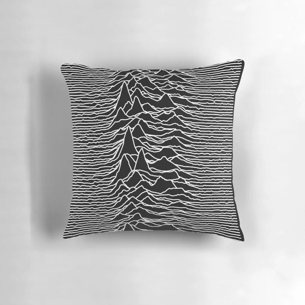 A dark, abstract art-inspired pillow featuring a design inspired by the iconic album cover of the 1970s-1980s indie rock band