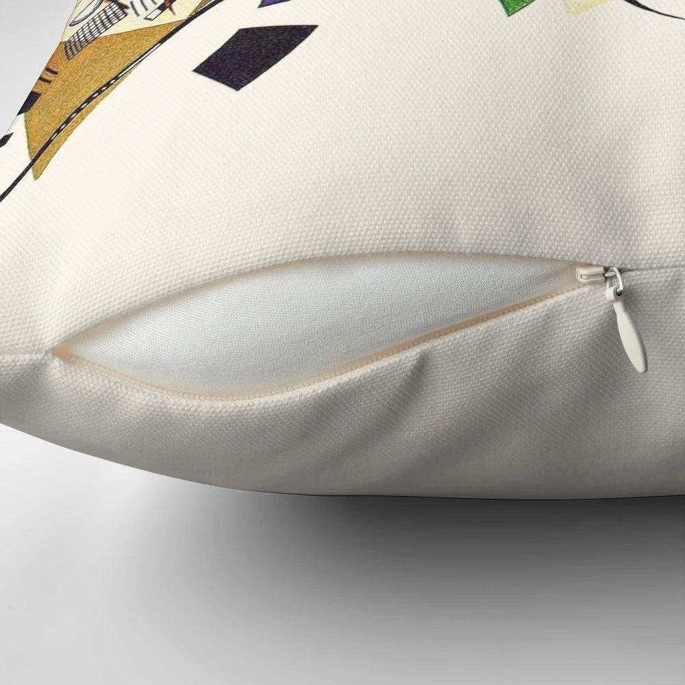 Decorative pillow featuring abstract art with intersecting lines inspired by the Bauhaus artist Wassily Kandinsky