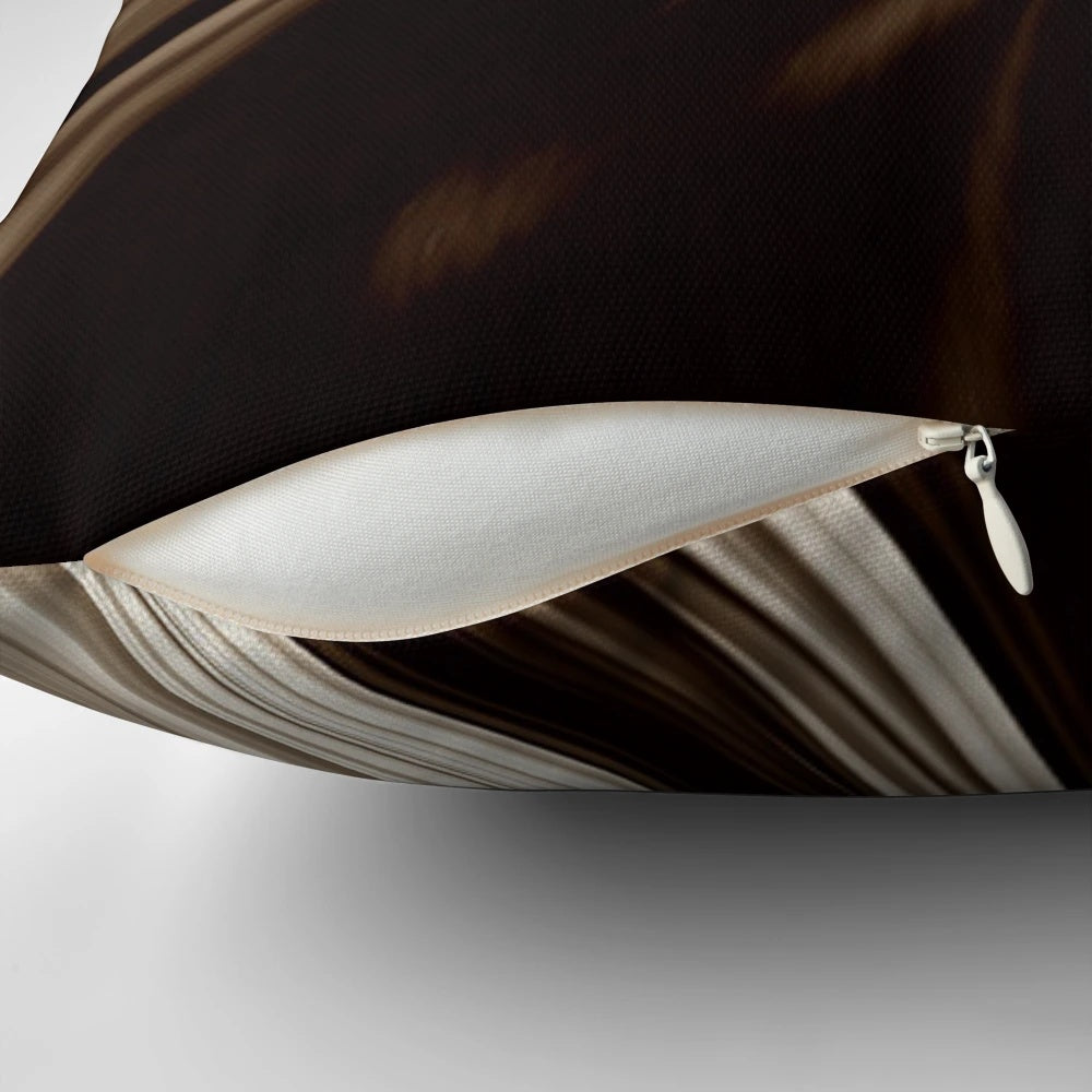 Abstract chocolate swirl print on a plush accent pillow for modern home decor
