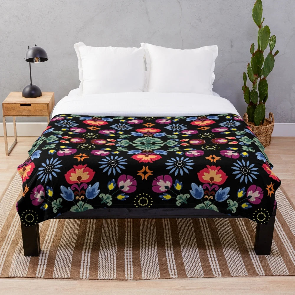 Fiesta folk inspired black plush blanket with abstract floral pattern