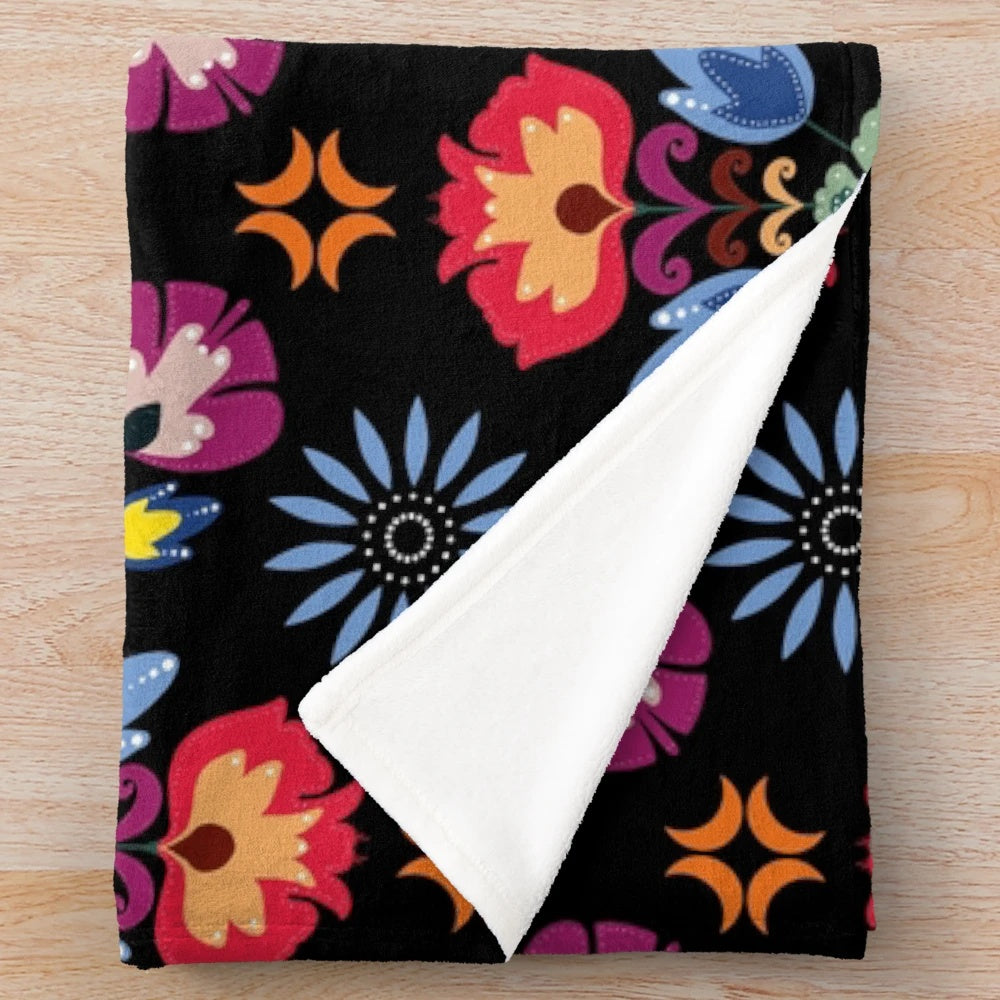 Fiesta folk inspired black plush blanket with abstract floral pattern