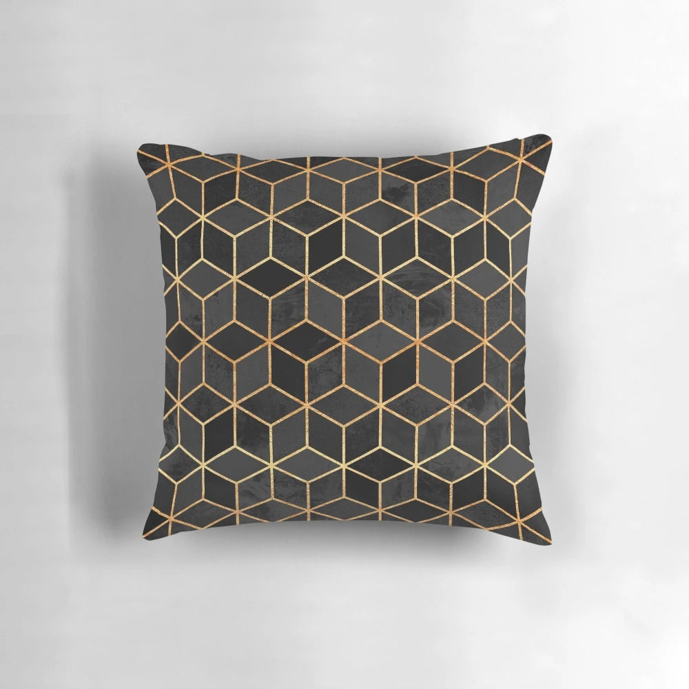 Black and gold modern minimalist pillow with abstract geometric cube and hexagon pattern