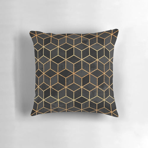 Black and gold modern minimalist pillow with abstract geometric cube and hexagon pattern