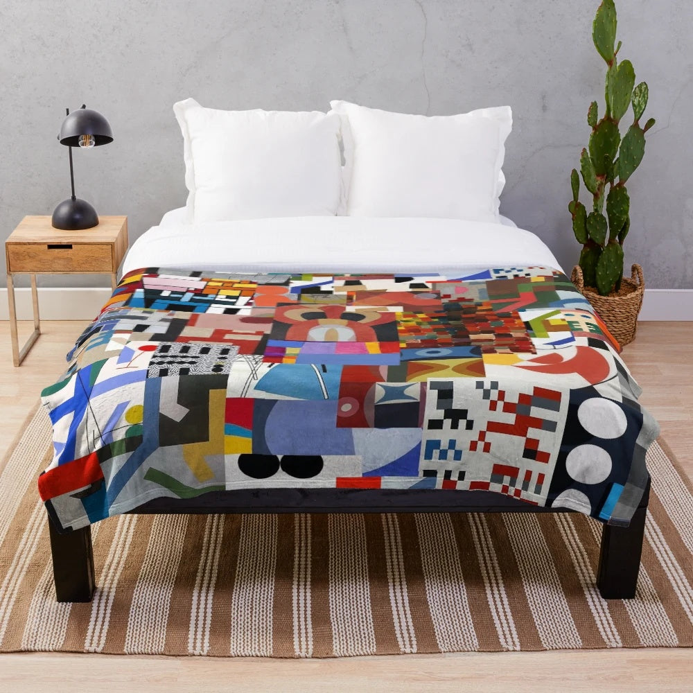 Soft, plush blanket with abstract geometric design inspired by the work of Swiss artist Sophie Taeuber-Arp