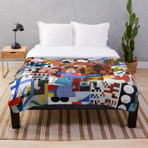 Soft, plush blanket with abstract geometric design inspired by the work of Swiss artist Sophie Taeuber-Arp