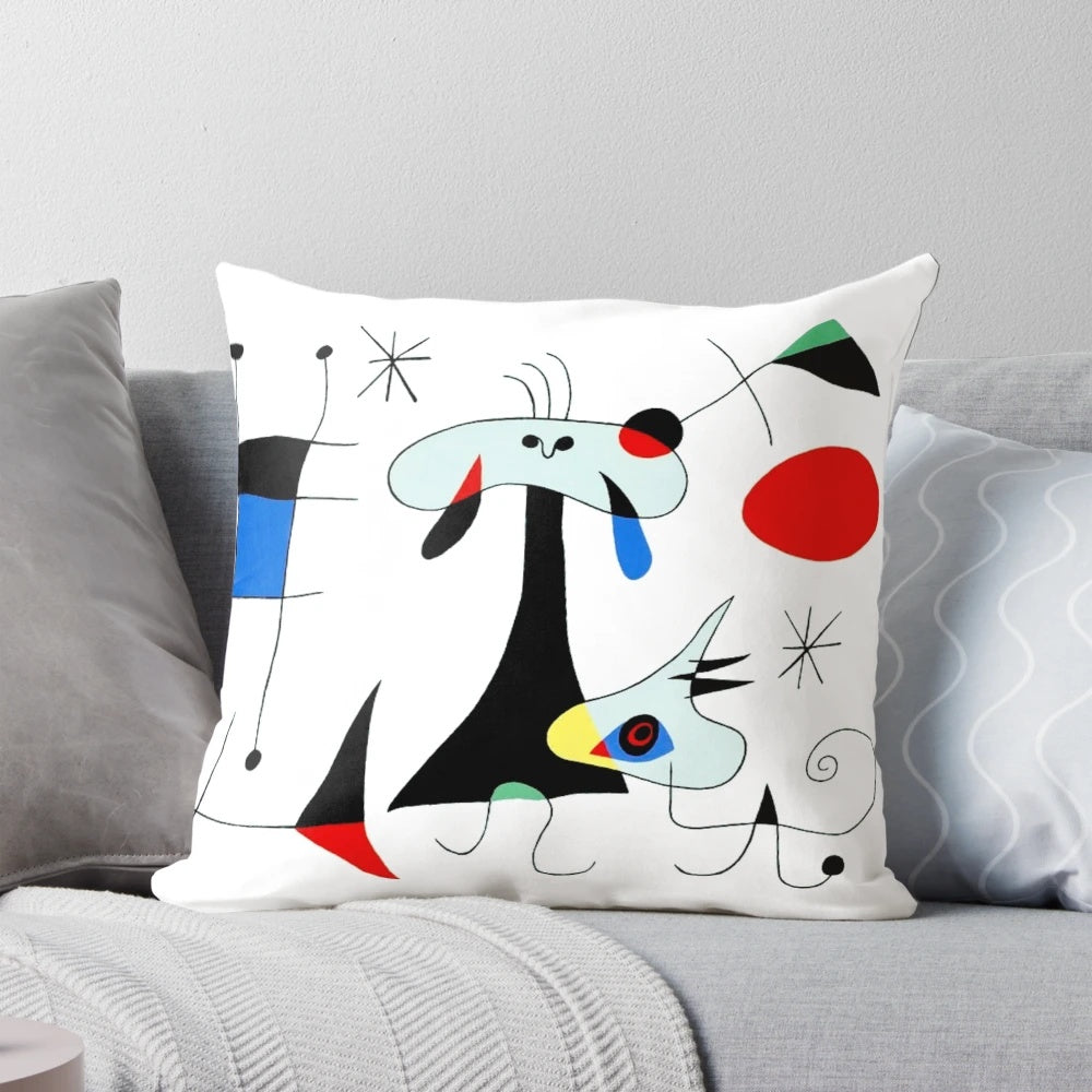 Abstract surrealist pillow with figures, dogs, and birds inspired by the iconic artwork of Joan Miró
