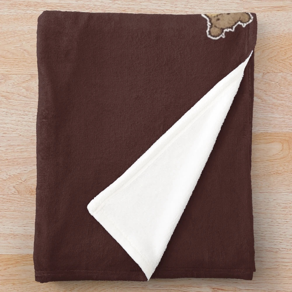 Plush blanket featuring an absurdist design inspired by young wine and cowboy cinema