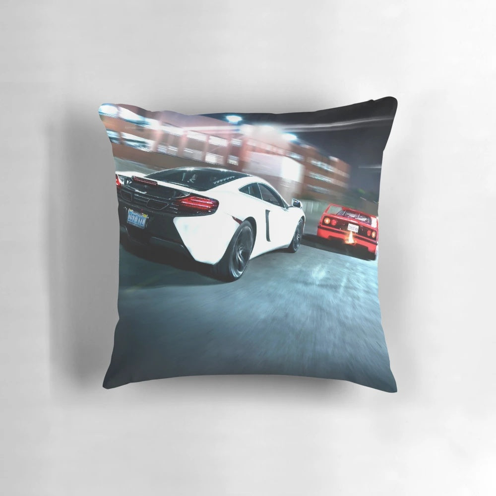 Close-up of the Hot Pursuit Pillow featuring sports car designs