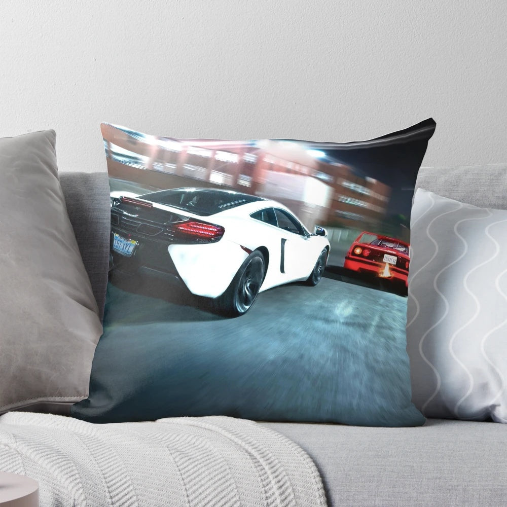 Close-up of the Hot Pursuit Pillow featuring sports car designs