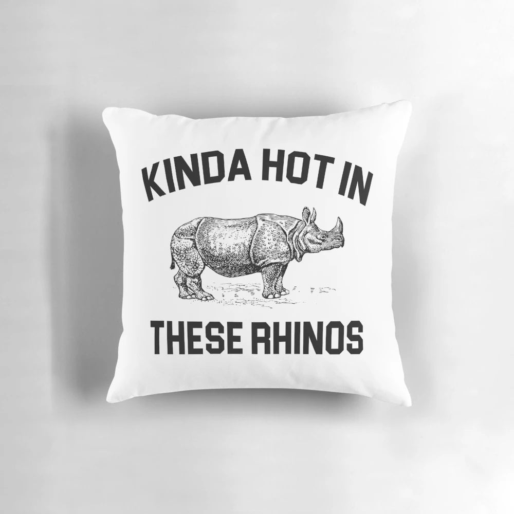 Ace Ventura "Kinda Hot in These Rhinos" quote printed on a pillow with a rhino illustration