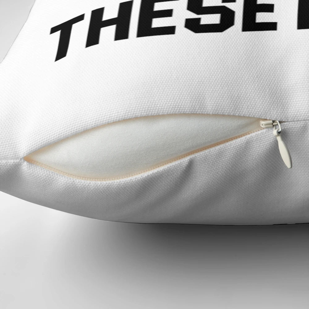 Ace Ventura "Kinda Hot in These Rhinos" quote printed on a pillow with a rhino illustration