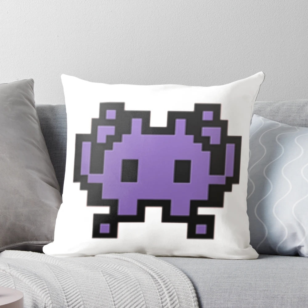 Alien monster emoji design printed on a plush, comfortable throw pillow.