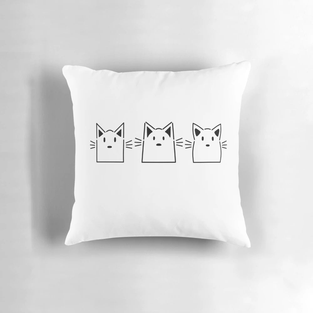 Angular cats line art design on a soft, plush pillow
