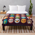 Smiley faces and cute animal designs on a soft, plush blanket