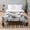 Cozy animal print plush blanket with illustrated design