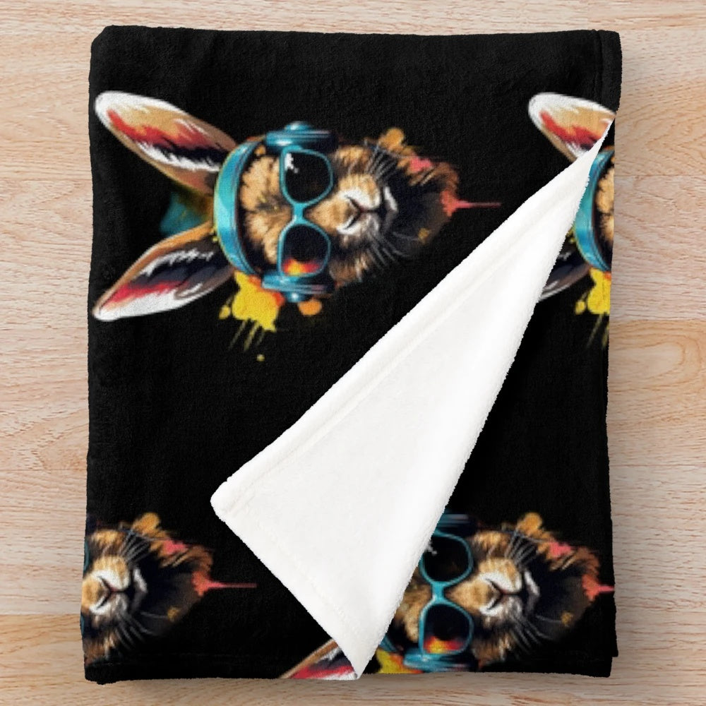 Cute plush blanket featuring an adorable animal design with glasses and headphones