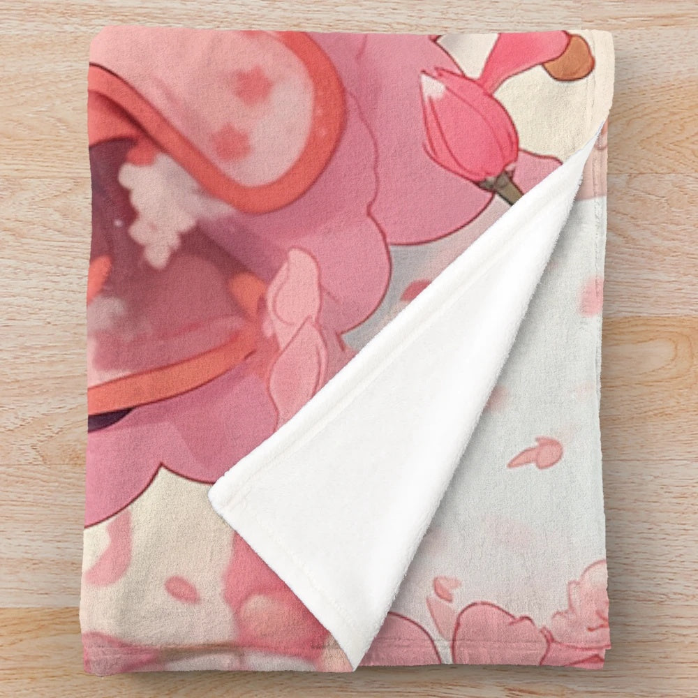 Soft, pink plush blanket featuring the characters Sakura and Kero from the popular anime series