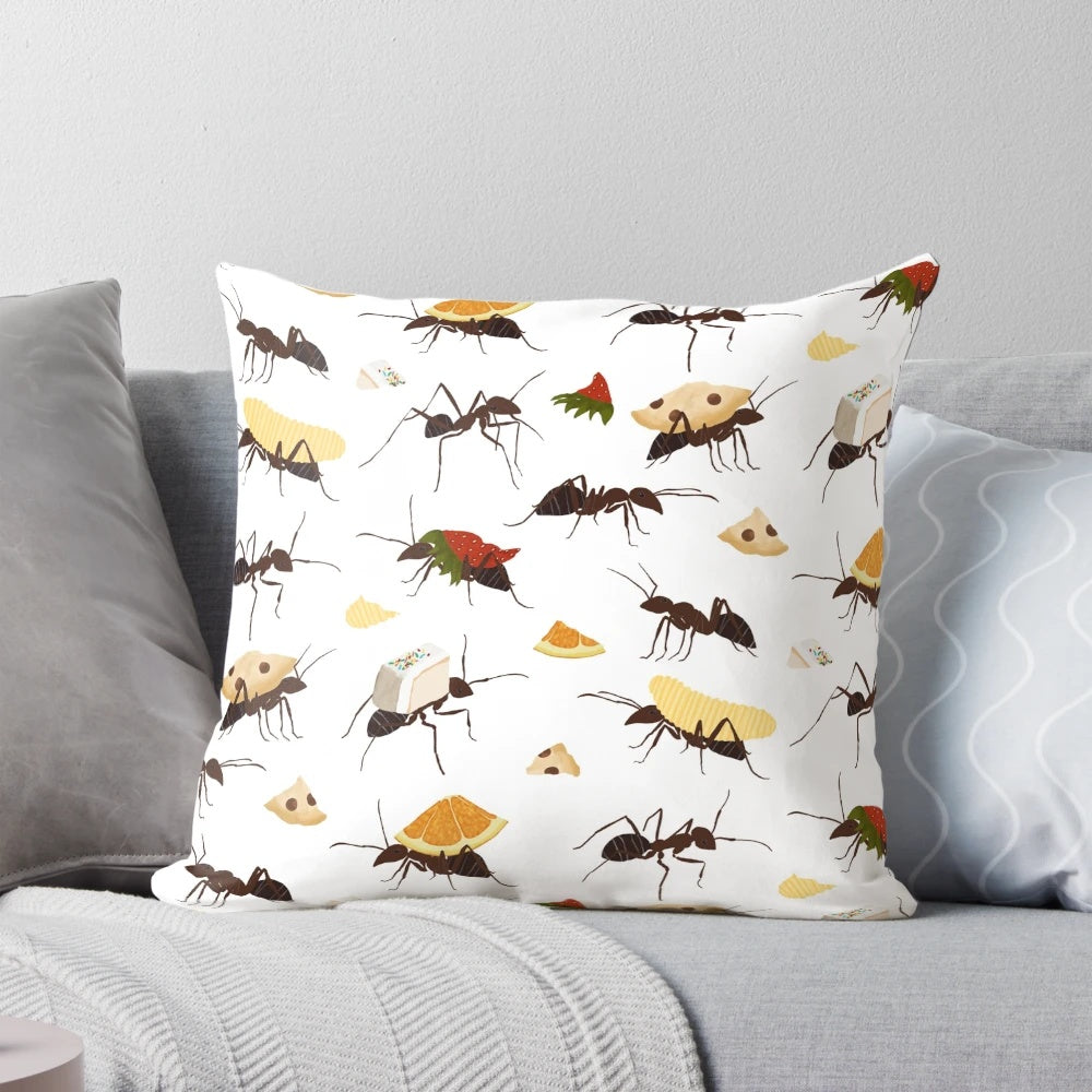 Decorative pillow featuring cute illustration of ants carrying various snacks